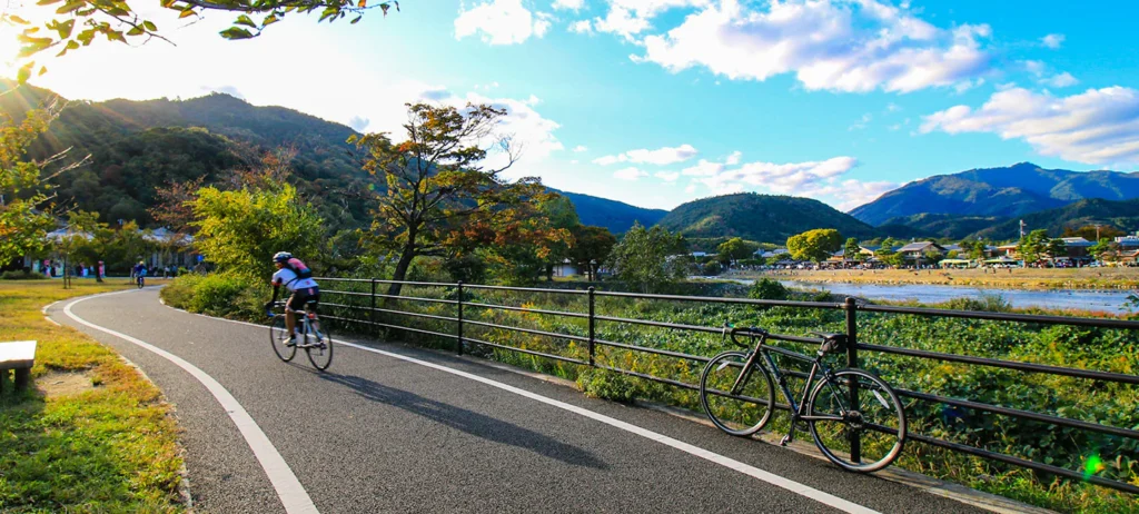 Cyclist along the Katsuragawa in Kyoto