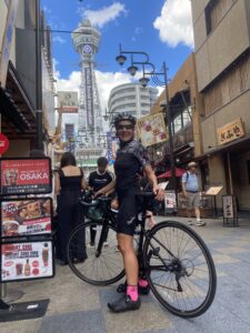 Cyclist enjoying the Osaka Harbor Tour by RBRJ. Cycle tours in Osaka